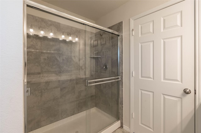 bathroom featuring a stall shower