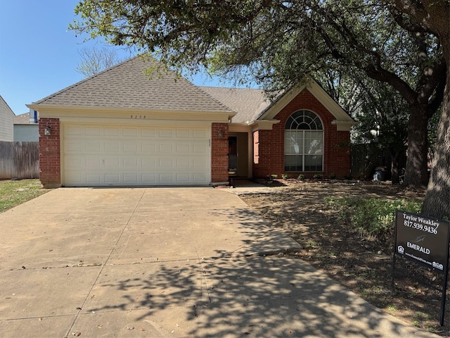 8208 Cloverglen Ln, Fort Worth, TX 76123 - single story home featuring brick siding, driveway, and a garage