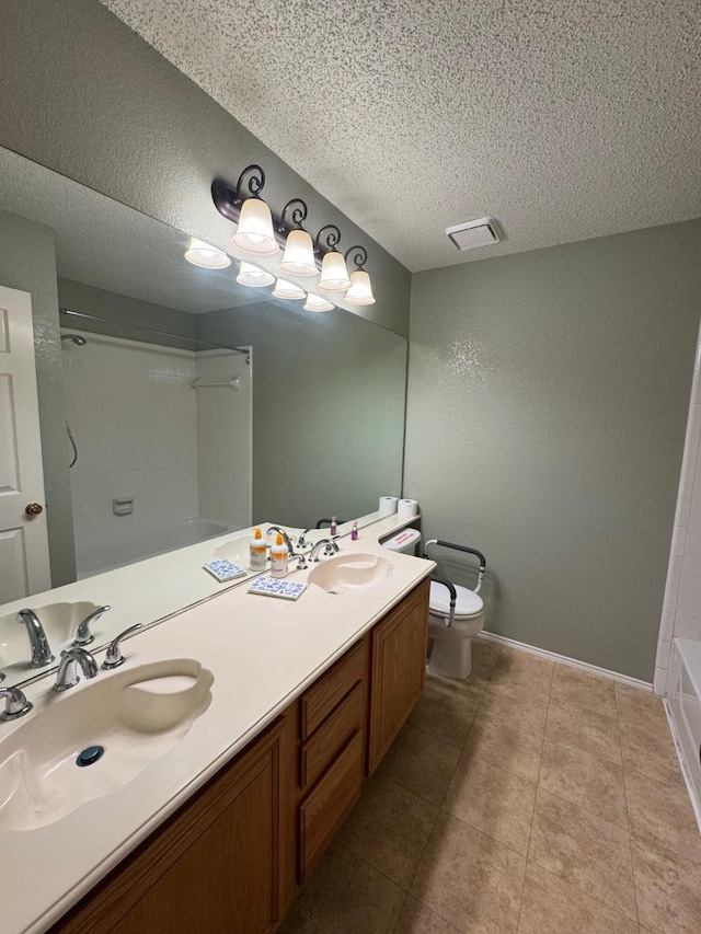 8208 Cloverglen Ln, Fort Worth, TX 76123 - bathroom featuring a sink, visible vents, toilet, and walk in shower