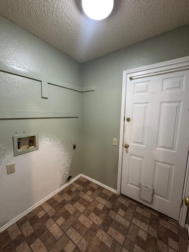 8208 Cloverglen Ln, Fort Worth, TX 76123 - laundry area featuring hookup for a washing machine, baseboards, brick floor, electric dryer hookup, and laundry area