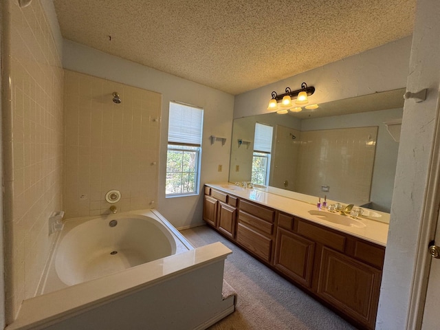 8208 Cloverglen Ln, Fort Worth, TX 76123 - full bathroom featuring double vanity, a sink, and a textured ceiling