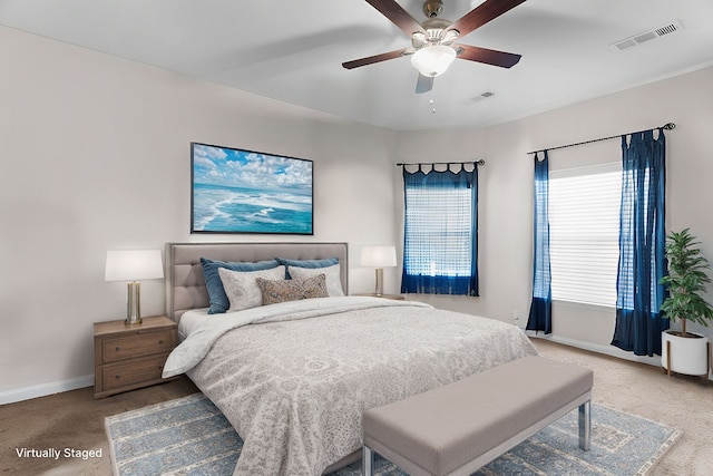bedroom featuring carpet flooring, baseboards, and visible vents