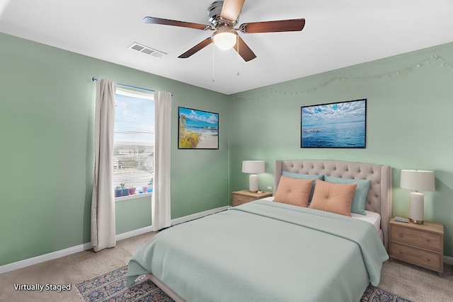 bedroom with visible vents, ceiling fan, baseboards, and carpet floors