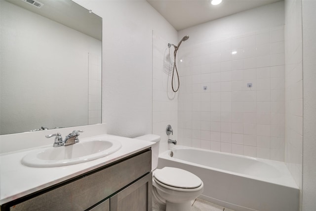 full bath featuring vanity, toilet, and shower / bathtub combination
