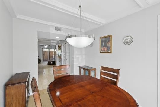 tiled dining space with visible vents