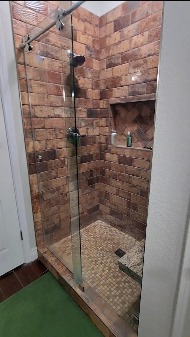 1426 Lakeview Rd, Abilene, TX 79602 - bathroom featuring a shower stall and wood finished floors