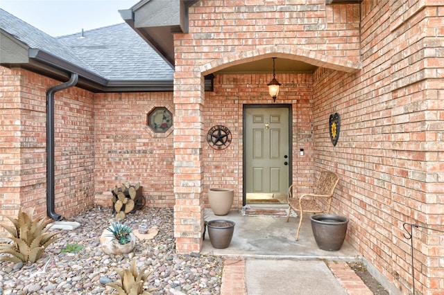 1426 Lakeview Rd, Abilene, TX 79602 - property entrance with brick siding and a shingled roof