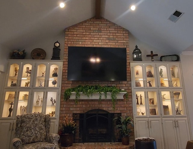 1426 Lakeview Rd, Abilene, TX 79602 - living room with visible vents, lofted ceiling, and a fireplace