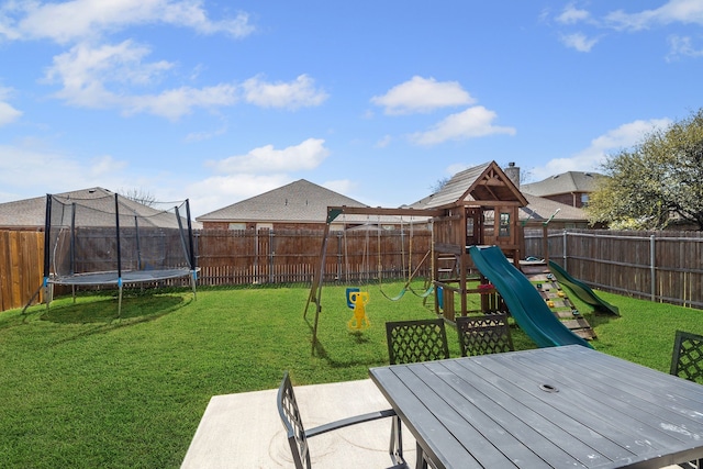 2408 Clairborne Dr, Fort Worth, TX 76177 - fenced backyard with a trampoline, a playground, and outdoor dining area