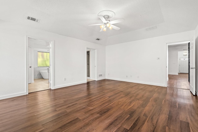 3005 Club Hill Dr, Garland, TX 75043 - unfurnished room with visible vents, a textured ceiling, ceiling fan, and dark wood finished floors