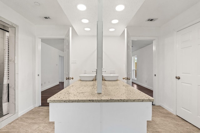 3005 Club Hill Dr, Garland, TX 75043 - bathroom with visible vents, recessed lighting, vanity, and baseboards