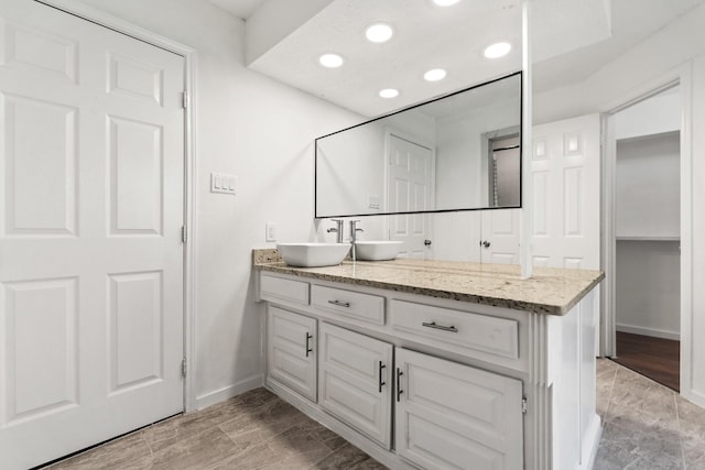 3005 Club Hill Dr, Garland, TX 75043 - full bathroom with recessed lighting, vanity, baseboards, and wood finished floors