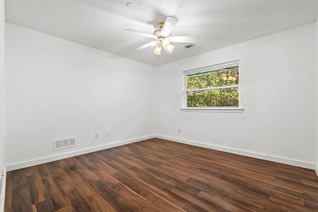 3005 Club Hill Dr, Garland, TX 75043 - unfurnished room with visible vents, baseboards, and dark wood-style floors