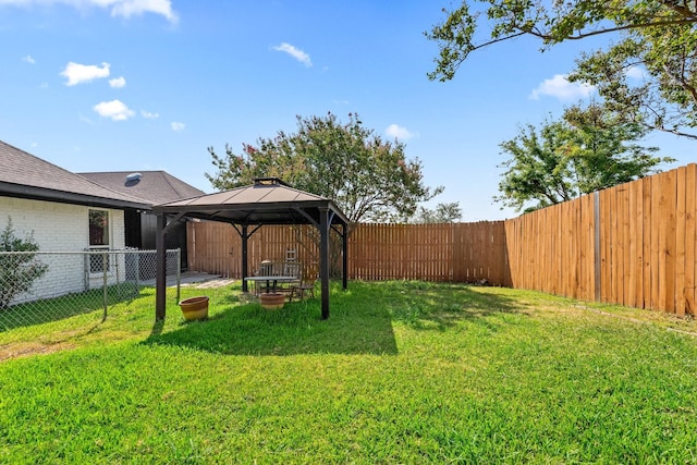 3005 Club Hill Dr, Garland, TX 75043 - view of yard featuring a gazebo and a fenced backyard