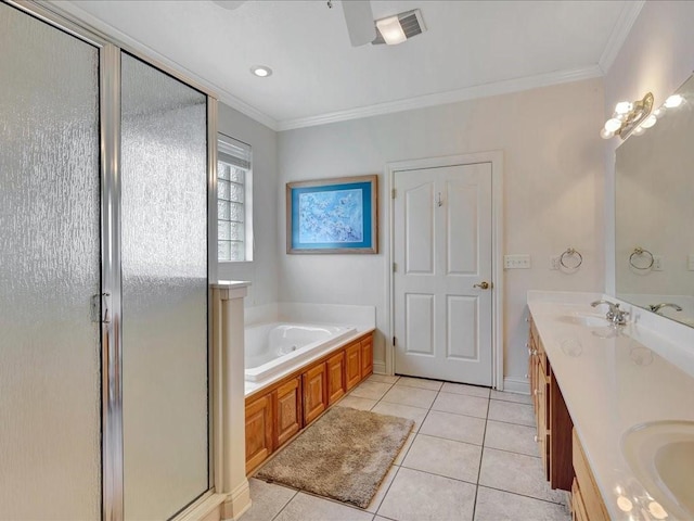 bathroom with a sink, crown molding, a stall shower, a garden tub, and tile patterned flooring