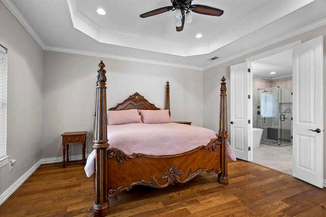104 Petes Ln, Ponder, TX 76259 - bedroom with wood finished floors, ensuite bath, a raised ceiling, recessed lighting, and crown molding