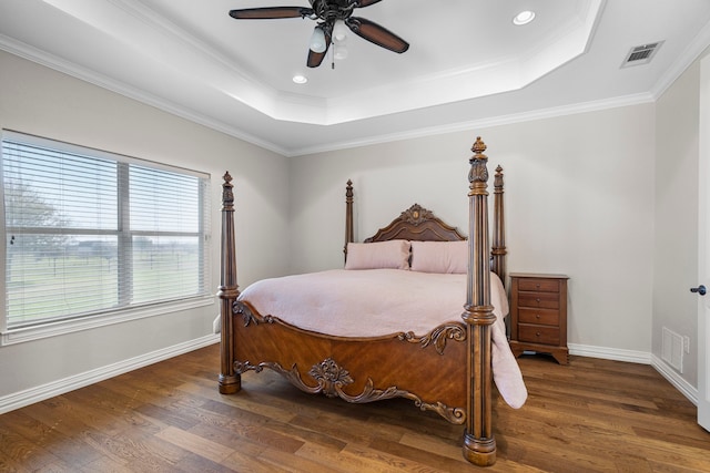 104 Petes Ln, Ponder, TX 76259 - bedroom with wood finished floors, a tray ceiling, baseboards, ornamental molding, and recessed lighting