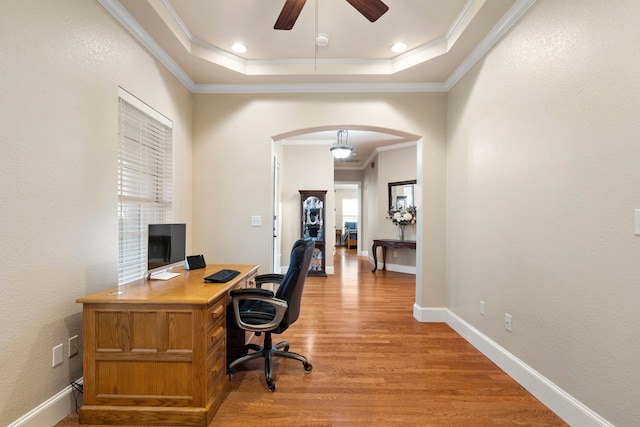 104 Petes Ln, Ponder, TX 76259 - office area featuring ceiling fan, arched walkways, light wood-type flooring, a raised ceiling, and ornamental molding