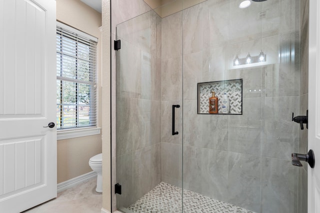 104 Petes Ln, Ponder, TX 76259 - full bath with a stall shower, toilet, and baseboards