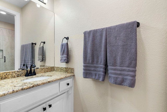 104 Petes Ln, Ponder, TX 76259 - full bathroom with vanity, a shower stall, and recessed lighting