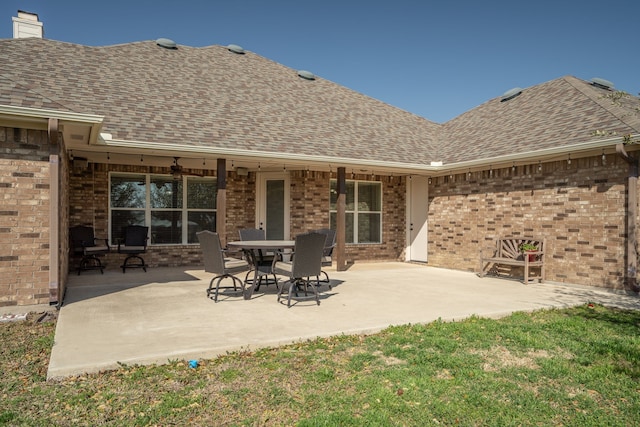 104 Petes Ln, Ponder, TX 76259 - rear view of property with a shingled roof and brick siding
