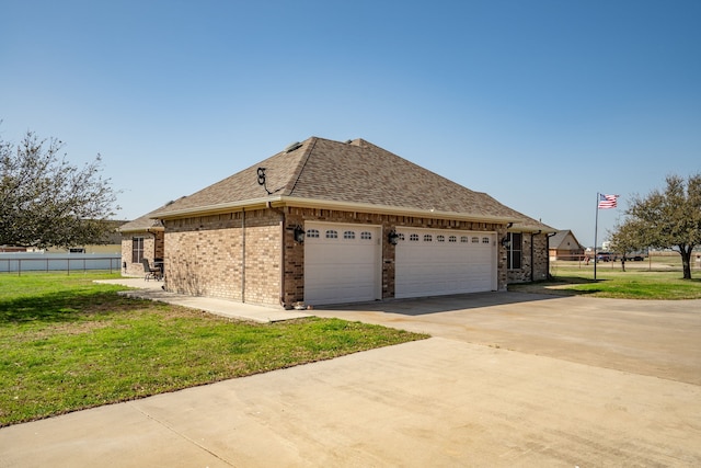 104 Petes Ln, Ponder, TX 76259 - view of side of property featuring concrete driveway, a garage, a shingled roof, and brick siding