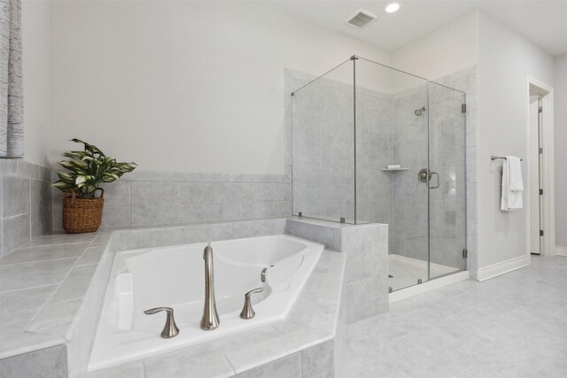 140 Dogwood Dr, Krugerville, TX 76227 - bathroom with visible vents, baseboards, a bath, and a shower stall