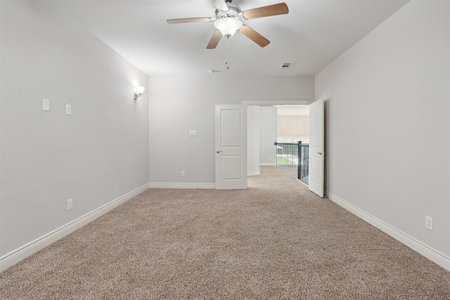 140 Dogwood Dr, Krugerville, TX 76227 - spare room with baseboards, a ceiling fan, visible vents, and light carpet