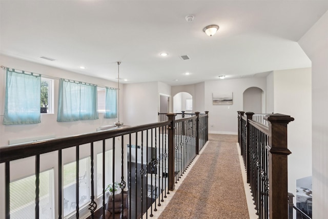 140 Dogwood Dr, Krugerville, TX 76227 - hall with visible vents, an upstairs landing, carpet, and baseboards