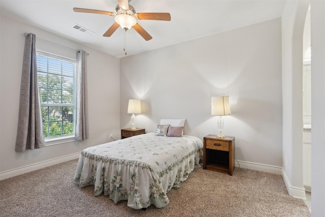 140 Dogwood Dr, Krugerville, TX 76227 - carpeted bedroom featuring arched walkways, visible vents, a ceiling fan, and baseboards