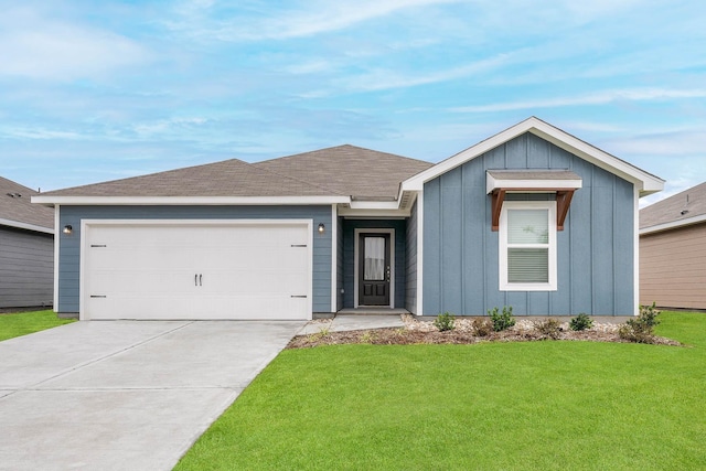 ranch-style home with a garage, board and batten siding, concrete driveway, and a front yard