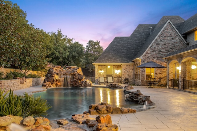 view of pool with a patio