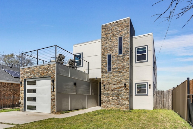 3725 Toronto St, Dallas, TX 75212 - exterior space with a yard, fence, stone siding, and driveway