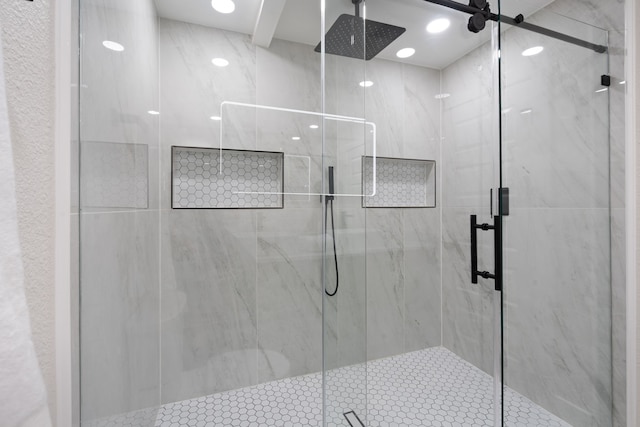 bathroom with a stall shower