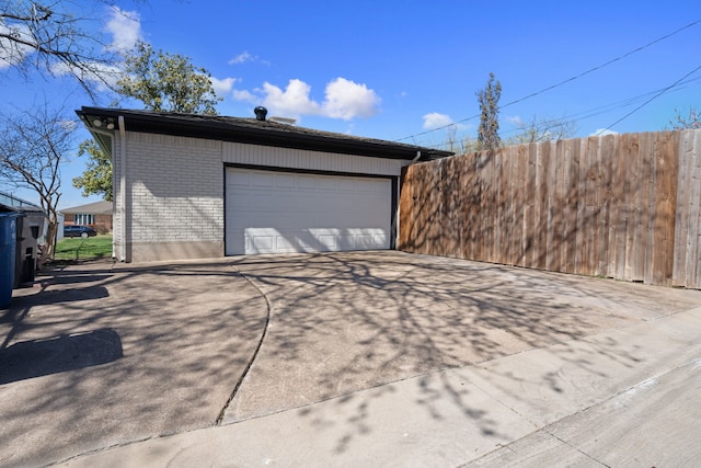 detached garage with fence