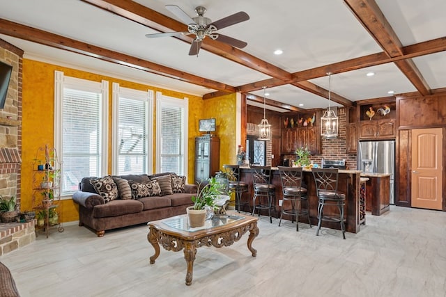 17909 Terrace Dr, Kemp, TX 75143 - living area featuring beamed ceiling, ceiling fan with notable chandelier, and wooden walls