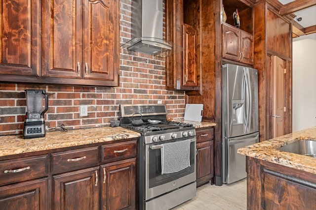 17909 Terrace Dr, Kemp, TX 75143 - kitchen featuring light stone counters, appliances with stainless steel finishes, wall chimney exhaust hood, and a sink