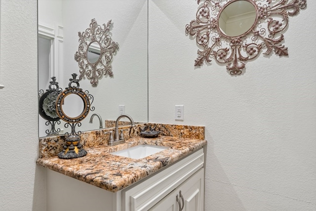 17909 Terrace Dr, Kemp, TX 75143 - bathroom featuring vanity and a textured wall
