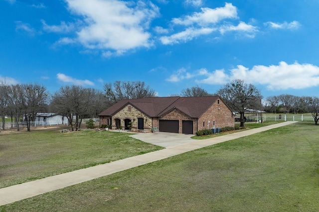 17909 Terrace Dr, Kemp, TX 75143 - french country home featuring a front yard, fence, a garage, and stone siding
