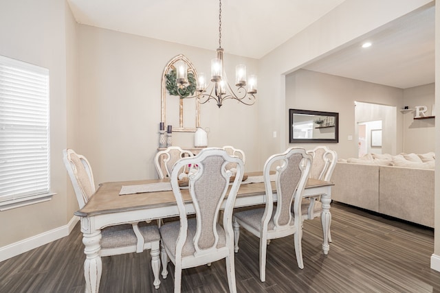 6409 Cypress Ln, Rowlett, TX 75087 - dining area featuring baseboards, a chandelier, and dark wood-style flooring