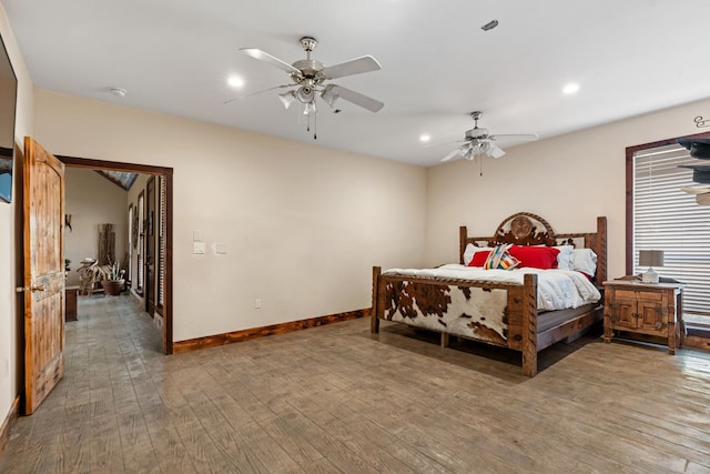 bedroom with recessed lighting, baseboards, hardwood / wood-style floors, and ceiling fan