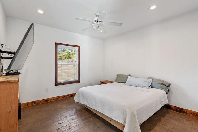 bedroom featuring recessed lighting, baseboards, wood-type flooring, and ceiling fan