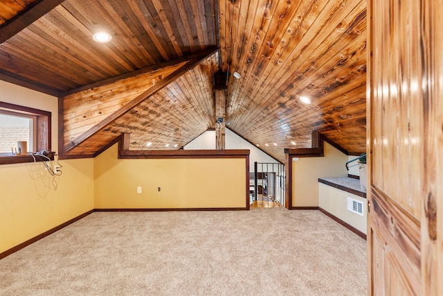 additional living space with wood ceiling, visible vents, carpet floors, and baseboards