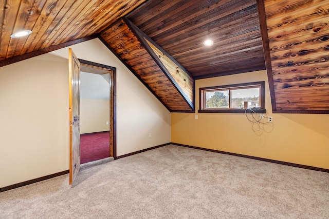 additional living space with light carpet, recessed lighting, wooden ceiling, baseboards, and vaulted ceiling