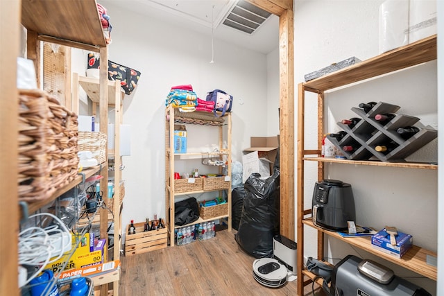 storage featuring visible vents and attic access