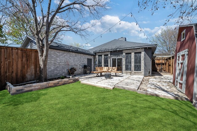 7829 Creekview Dr, Frisco, TX 75034 - rear view of house featuring a patio and a shingled roof