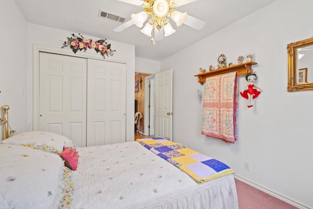 bedroom featuring visible vents, a closet, carpet, baseboards, and ceiling fan