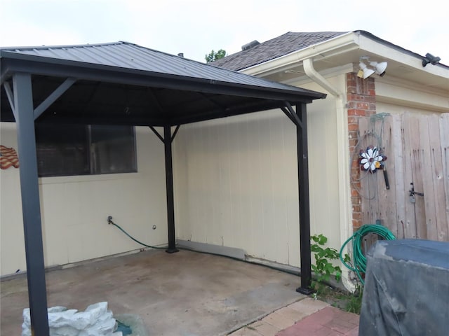 313 Conger Dr, Mesquite, TX 75149 - view of side of property with a gazebo and brick siding