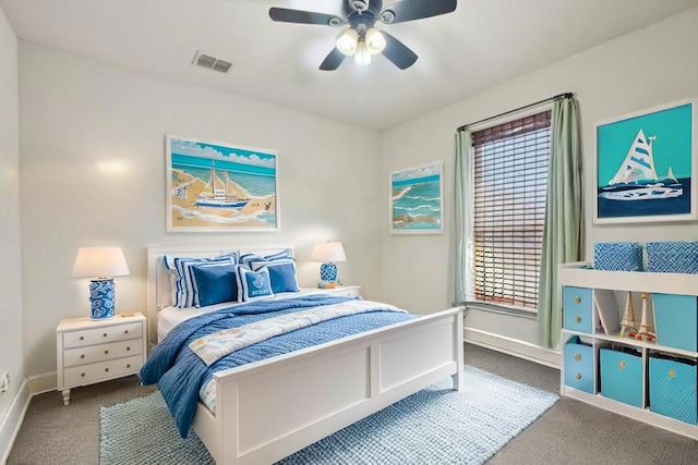 bedroom with ceiling fan, visible vents, baseboards, and carpet