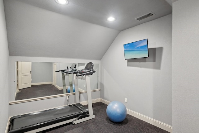 workout area featuring visible vents, baseboards, recessed lighting, and lofted ceiling